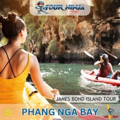 two sea canoes with tourists paddling near James Bond island in phang nga bay