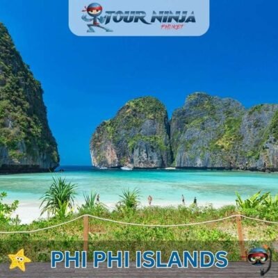 maya bay phi phi island viewed from the beach with its beautiful white sand and turquoise sea and limestone rock formations