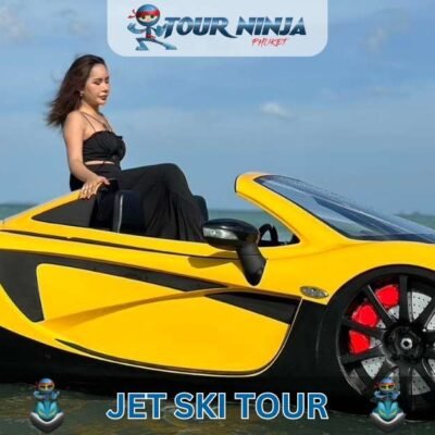 lady in black dress posing on bright yellow jet ski car in Phuket