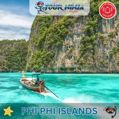 panoramic view of longtail boat in clear water driving towards Phi Phi island limestone cliffs