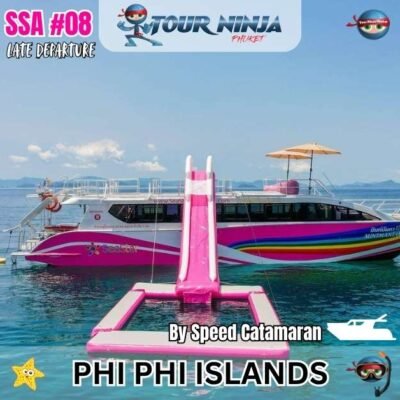 pink speed catamaran boat with large water slider parked in the sea in the area of koh phi phi islands