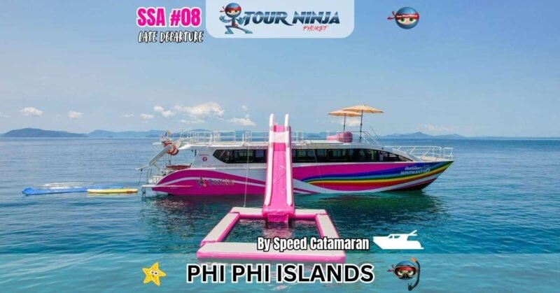 pink speed catamaran boat with large water slider parked in the sea in the area of koh phi phi islands