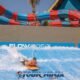 andamanda phuket water park with one male body surfing the waves in the flow rider attraction