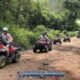 atv jungle safari tour with a group of atv riders following each other on the jungle trails