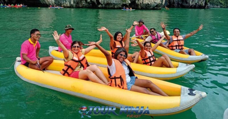 best-sea-canoe-trip-phangnga james bond island daytrip with a group of six happy indian tourist divided into three canoes with each a tour guide