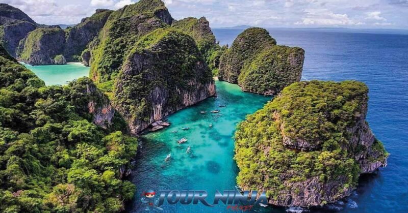 best-snorkeling-tour-phi-phi photo of phi phi island from a drone with a spectacular view of loh samah bay and maya bay a picture worth a thousand words