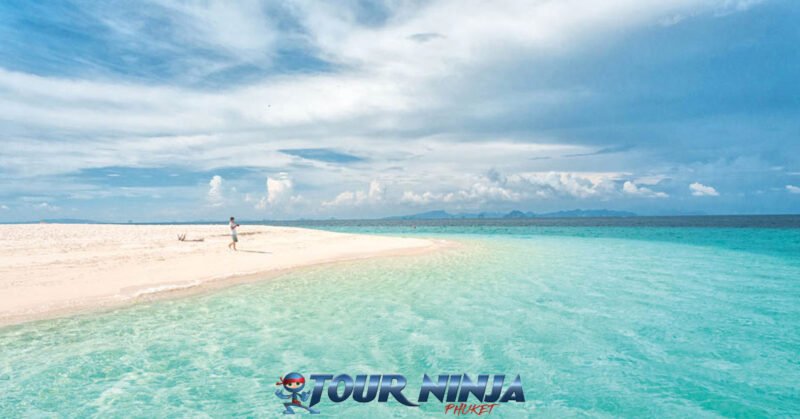 daytrip-phiphi-bamboo-island-s2 bamboo island phi phi islands viewed from the sea with its beautiful white sandy beach and turquoise sea on a bright sunny day