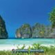 maya bay phi phi island viewed from the beach with its beautiful white sand and turquoise sea and limestone rock formations