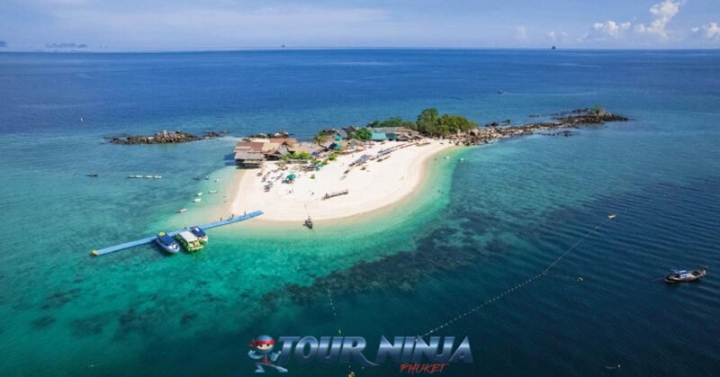 daytrip-phiphi-khai-island-s1 khai island seen from above by a drone shot with its white sandy beaches and clear tropical blue sea