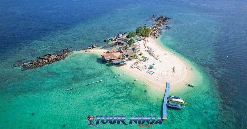 daytrip-phiphi-khai-island-s2 khai island seen from above by a drone shot with its white sandy beaches and clear blue sea