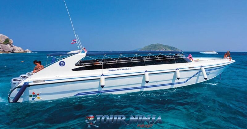 daytrip-similan-island-snorkeling-s3 similan islands daytrip with a white speedboat moored up at island number four above the coral reef