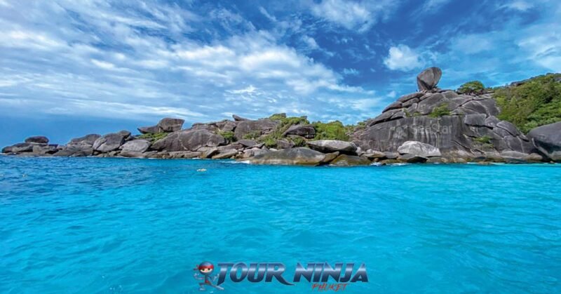 daytrip-snorkeling-similan-island-s3 similan island inside donald duck bay on a beautiful bright sunny day with its crystal clear sea