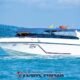 surin island daytrip with a white speedboat cruising by on a nice sunny day