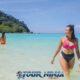 surin island daytrip with two female tourists wearing swimsuits enjoying the beautiful andaman sea