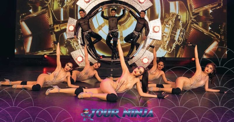 drag-queen-performance-show-phuket simon cabaret phuket with a group of drag queen performers dressed in sexy lingerie laying on stage