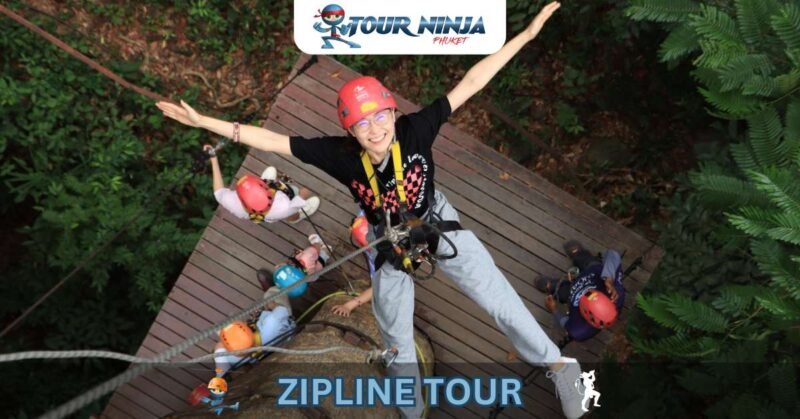 zipline-abseil-hw1 smiling girl with outstretched arms looking up mid-descent during abseil on zipline tour. platform with other people can be seen below.