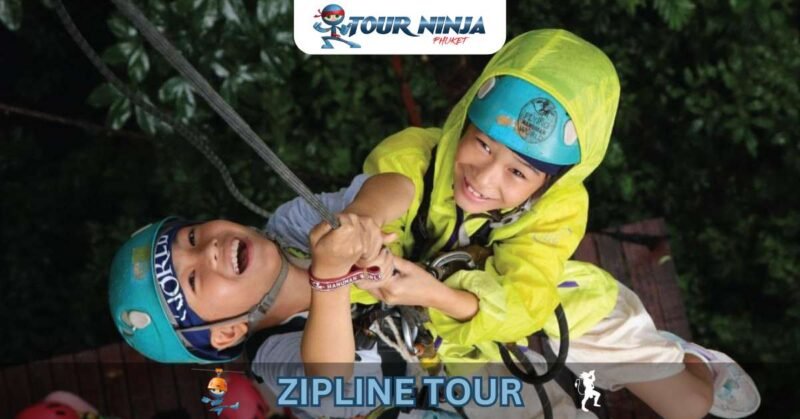 zipline-kids- abseil-hw1 two laughing young kids look up during abseil decent at zipline platform