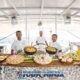hype luxury sailing catamaran buffet station showing amazing array of prepared food dishes with three chefs in background under white canopy