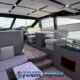hype luxury cruising yacht interior of main saloon cabin showing comfortable white wrap-around seating and white ceilings with windows all around