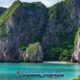 maya bay classic beauty showing turquoise sea with impressive overgrown limestone cliffs and small sandy bay