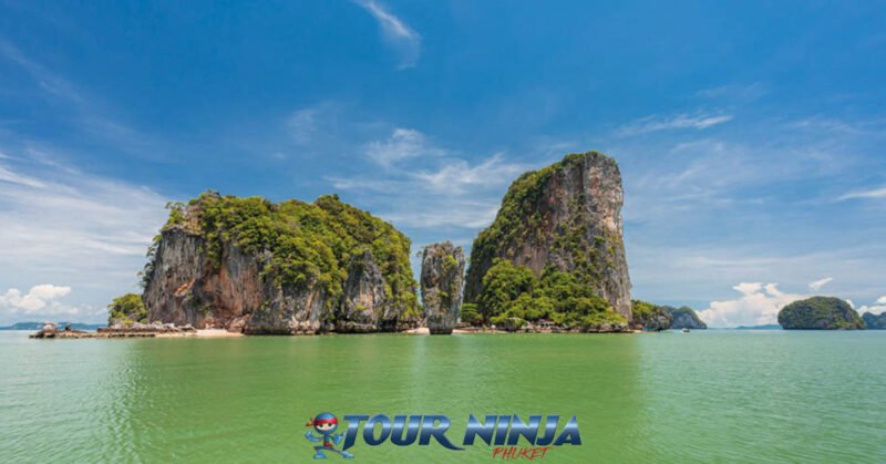 phangnga-bay-boat tour-1 panak island located in phang nga bay viewed from a speedboat on a beautiful clear sunny day