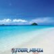 coral island beautiful stretch of white beach and crystal clear sea with blue sky and tropical islands in background