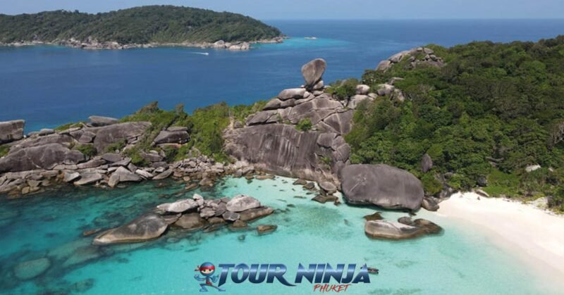 similan-island-daytrip-snorkeling-3 similan island donald duck bay large rock formations viewed from a drone shot with its amazing beach and crystal clear sea