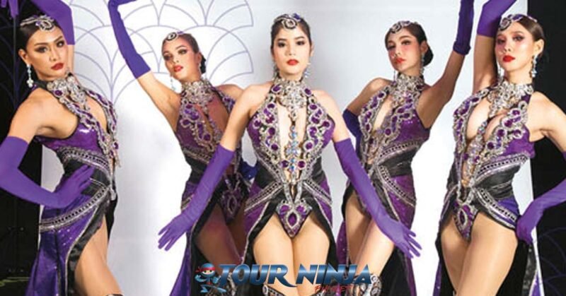 simon-cabaret-phuket-show simon cabaret phuket with a group of five ladyboy artists dressed in short purple and black costumes