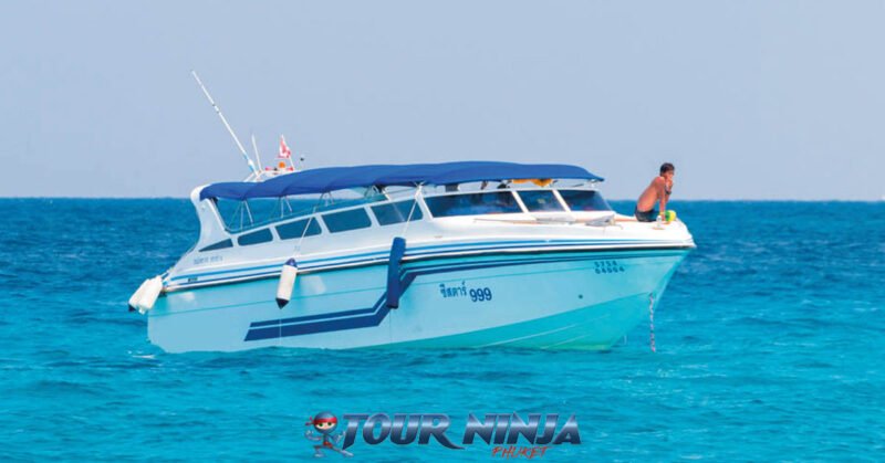 snorkeling-daytrip-racha-island-s1 racha islands with a white speedboat moored up surrounded by clear blue water on a sunny day