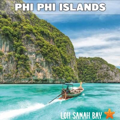 pileh lagoon phi phi island with one longtail boat cruising at speed inside the beautiful lagoon with its clear blue sea