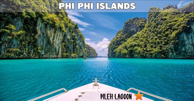 pileh lagoon phi phi island viewed from a speedboat surrounded by limestone rock formations on a bright sunny day
